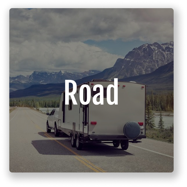 Road with truck and camper