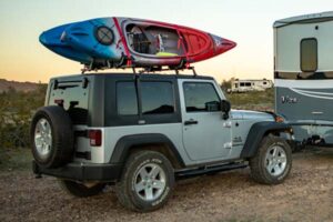 jeep with kayaks on roof rack