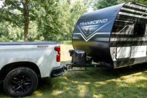 truck pulling camper with weight distribution installed